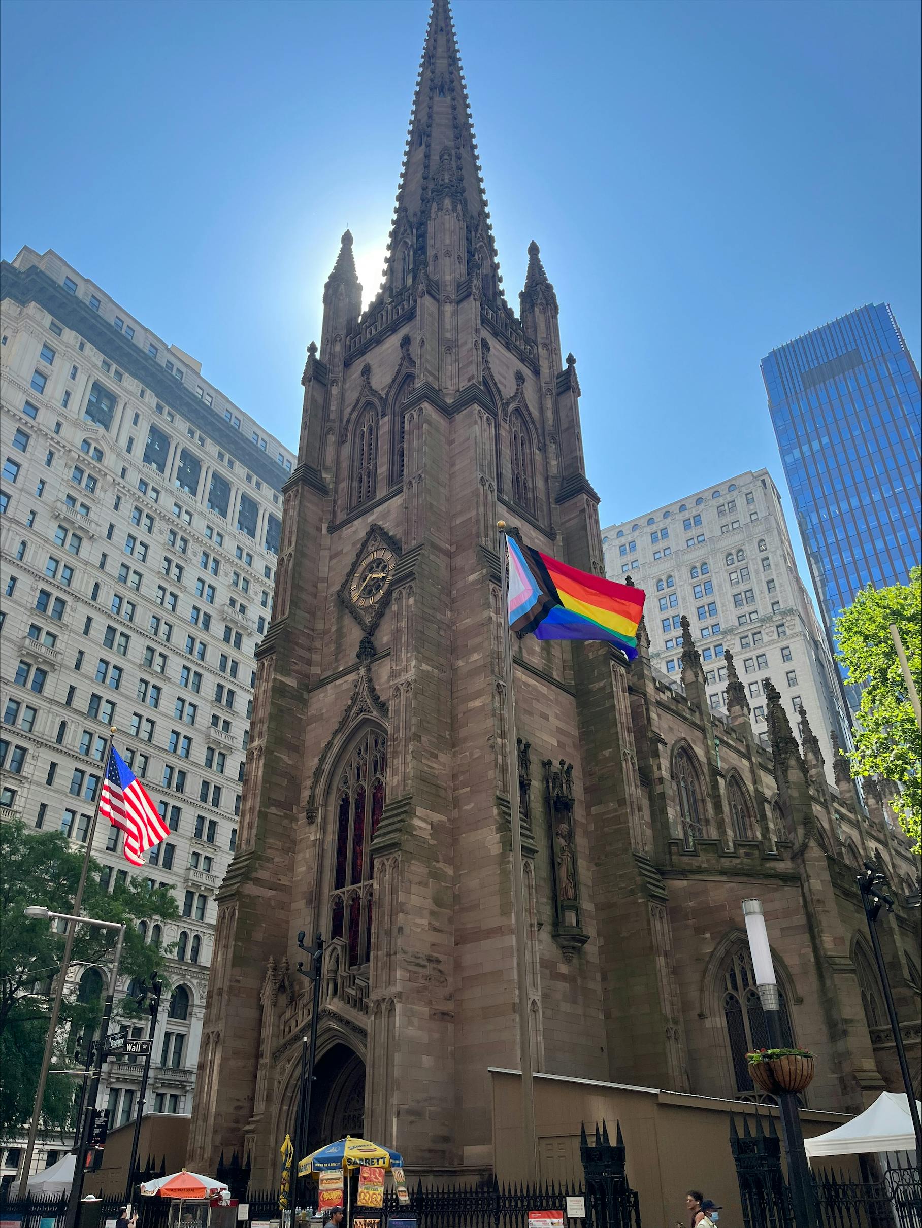 Image of Pride Flag in front of Trinity Church